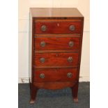 A 19th century rosewood banded mahogany small chest of four drawers, with ebony line inlay, drop