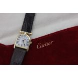 Cartier, a lady's 18ct gold Romane wristwatch, quartz movement, sapphire crown, brown Cartier