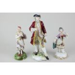 A Meissen style Continental porcelain figure of an officer with tricorn hat and sword, mark to base,