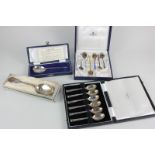 A cased set of six modern silver coffee spoons with gilt bowls, maker Cooper Brothers, Sheffield