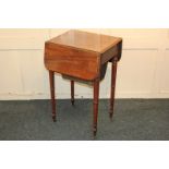 A Victorian mahogany drop-leaf work table with drawer above pull-out silks box, on turned legs and