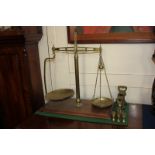 A set of shop brass scales, with dish pans, central column marked Co-Operative Wholesale Society,
