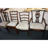 A collection of four various 19th century dining chairs to include a Chippendale style carver