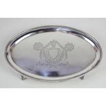 A George V silver oval card tray, maker Barker Brothers, Chester, 1912, with engraved vacant