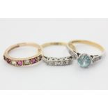 A blue zircon and diamond ring in 18ct gold and platinum, a diamond five stone ring, and a ruby