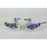 A pair of Chinese white metal and enamel duck shaped sauce or condiment pots with multi-coloured