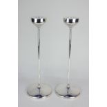 A pair of Elizabeth II 1977 silver candlesticks of plain modernist form, maker Robert Welch,