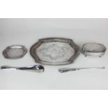 A Chinese white metal part dressing table set comprising tray, dish, box, button hook and shoe horn,