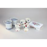 A pair of Emma Bridgewater polka dot egg cups, two similar, a pair of porcelain cream jugs, and a