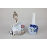 A Lladro porcelain figure of a seated girl making a telephone call, 20cm high, together with a Royal