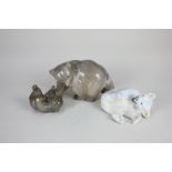 Three Royal Copenhagen porcelain models of bears comprising a brown bear with cub, and a polar