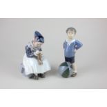 A Royal Copenhagen porcelain figure of a seated girl sewing, 15cm, and a boy with a beach ball,