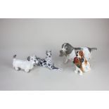 A Royal Copenhagen porcelain model of a Great Dane, a Royal Doulton spaniel with pheasant, a