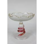 An unusual frosted glass tazza with pink snake overlaid design and gilt embellishment (a/f - tip