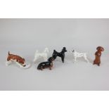 Six Beswick porcelain small models of dogs, Dalmatian (No 1763), dachshund seated (No 1460,