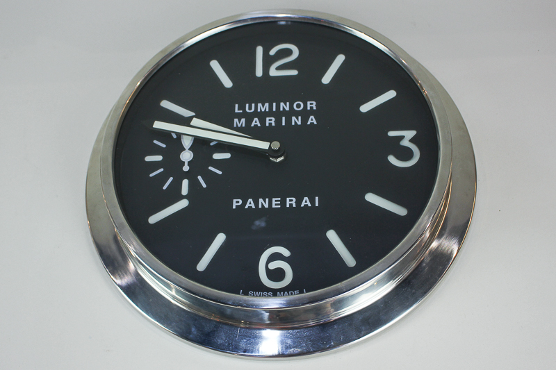 A Panerai advertising wall clock, the face marked Luminor Marina, with secondary dial, 32.5cm