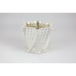 A Belleek porcelain vase with spiral shell shape pattern, black printed mark to base, 14cm