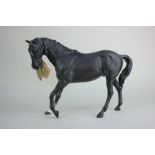 A Beswick model of a horse, Black Beauty, 18cm, with paper maker's tag