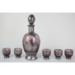 A Venetian amethyst glass decanter with five matching glasses, with overlaid silver design depicting