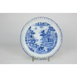 A Davenport blue and white porcelain side plate with pierced border and willow pattern style