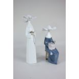 Two Lladro porcelain nuns, one standing, 26.5cm, the other sewing, seated, 20cm