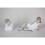 A Lladro porcelain figure of a seated angel, 10.5cm, together with a Nao porcelain ballerina