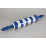 A T.G Green & Co Cornishware pottery rolling pin with wooden handles, 46cm