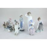 A Lladro porcelain figure of a girl picking flowers, 21cm, together with a Nao figure group of a