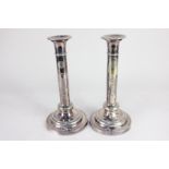 A pair of Elkington & Co silver plated column candlesticks, with engraved star of David, Jewish text