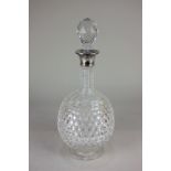 An Elizabeth II silver collared cut glass spirit decanter, maker Asprey & Co Ltd, London 1970