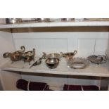 A collection of silver plated items including circular entree dish, three piece tea set, cruet set