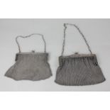 A George V silver cocktail mesh bag with clasp and chain, London 1926, and another similar with