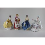 Four Royal Doulton figures comprising Old Country Roses HN3692, Melanie HN2271, Diana HN2468, and