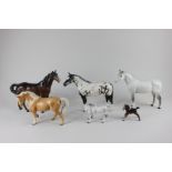 Six Beswick porcelain models of horses, Appaloosa stallion (1772), Bois Roussel racehorse (701) (a/