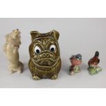 A Sylvac Pottery bulldog money box, a Sylvac dachshund, and two Beswick birds, chaffinch and wren