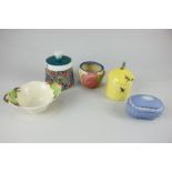 A Bizarre by Clarice Cliff Fantasque preserve pot decorated with a melon and other fruit, 6cm, (a/