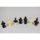 A collection of seven early 20th century pottery pastry birds, one marked Made in England, tallest