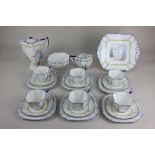 A Shelley porcelain tea set for six in the My Garden pattern, comprising hot water jug, sugar