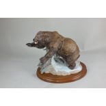 A porcelain model of a grizzly bear, produced by Franklin Mint for the National Wildlife Federation,