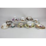 A collection of nine various porcelain cups and saucers, to include two Dresden chocolate cups and