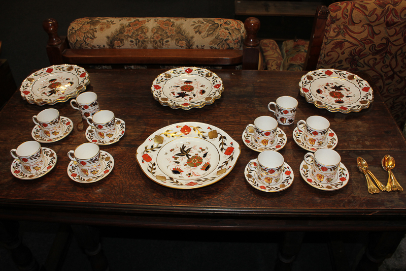 A collection of Royal Crown Derby Imari pattern porcelain to include ten coffee cans, eight