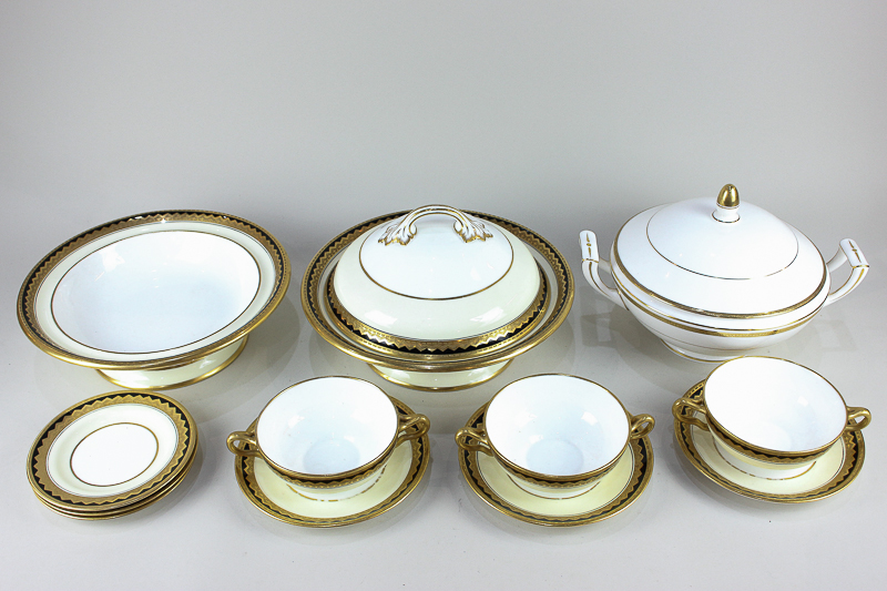 A Wedgwood porcelain part dinner service comprising tureen and cover, three soup bowls with saucers,