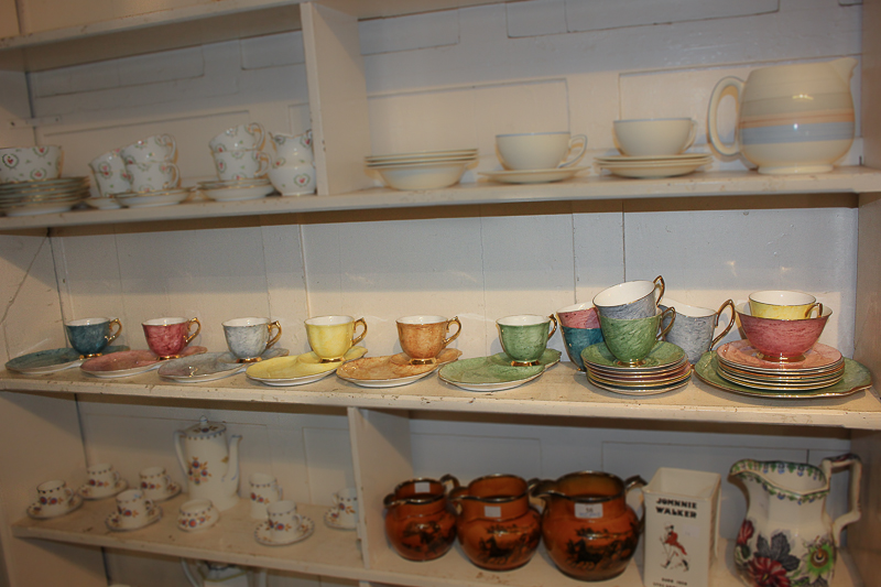 A Royal Albert 'Gossamer' part tea and coffee set, in harlequin colours, comprising six teacups