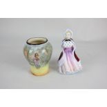 A Paragon porcelain figure of a girl, Miss Susan, together with a Royal Doulton series ware vase