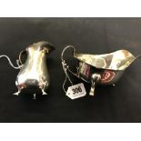 Hallmarked Silver: Sauce boat, Sheffield and a cream jug, Birmingham. 7ozs.