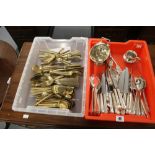 Flatware: Plated ware cutlery part set, a gilt brass part set, a sugar scuttle and shover, a cream