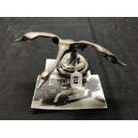 Automobilia: Car mascots Sasportas Swan landing wings outstretched chrome on brass (various wear