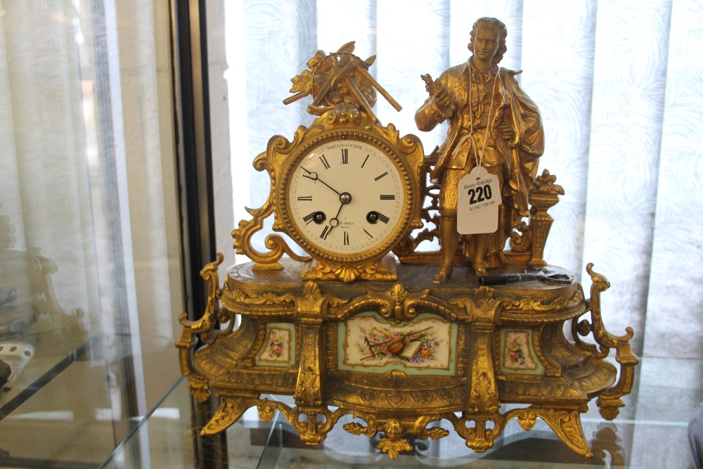 Clock: 19th cent. Henry Marc, Paris, gilt metal mantle timepiece. Floral ceramic panel, signed white