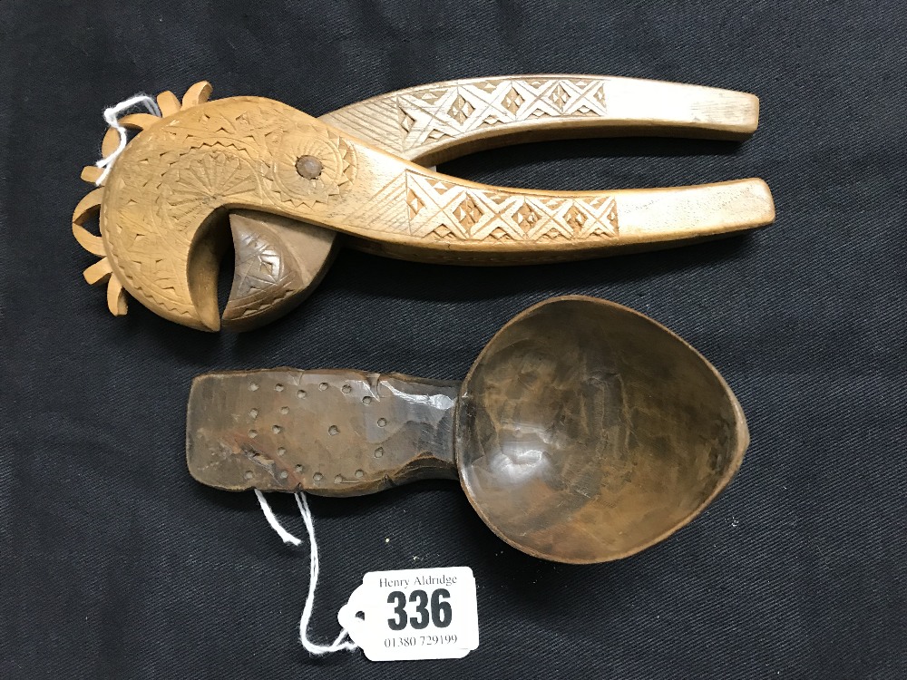 Treen Ware: 20th cent. Beech nut cracker, Scandinavian design plus a treen spoon.