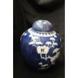 20th cent. Oriental: Blues and white ginger jar and cover.